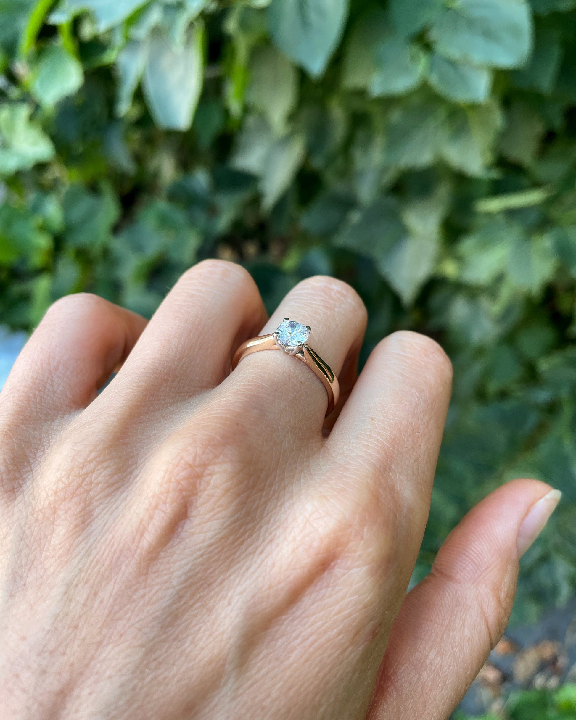 Hand wearing a gold ring with a gemstone-IGI certified lab-grown diamond  0.5 ct, VVS2 / D color-Classic solitaire setting
