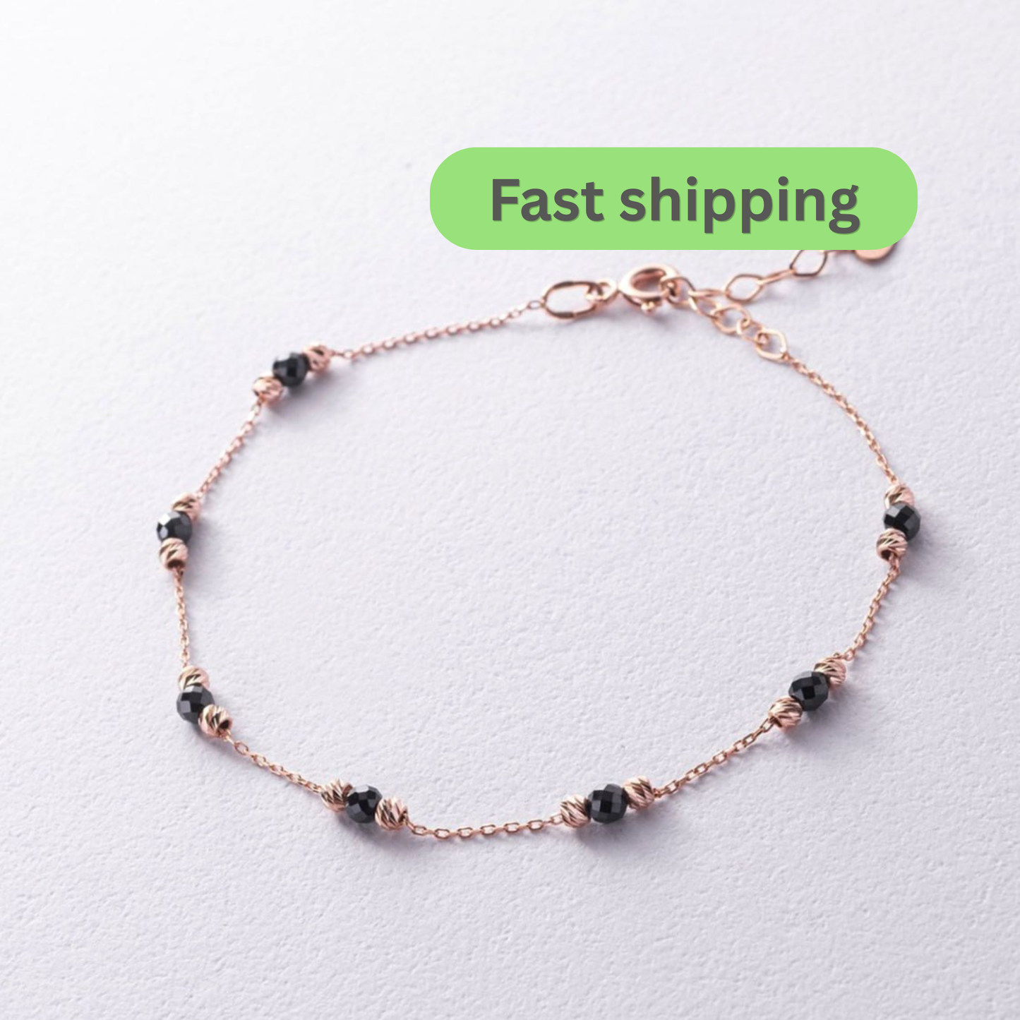 A delicate rose gold chain bracelet with small black beads and twisted metal accents-rose gold black stone bracelet
black CZ rose gold bracelet-14k rose gold bead bracelet
