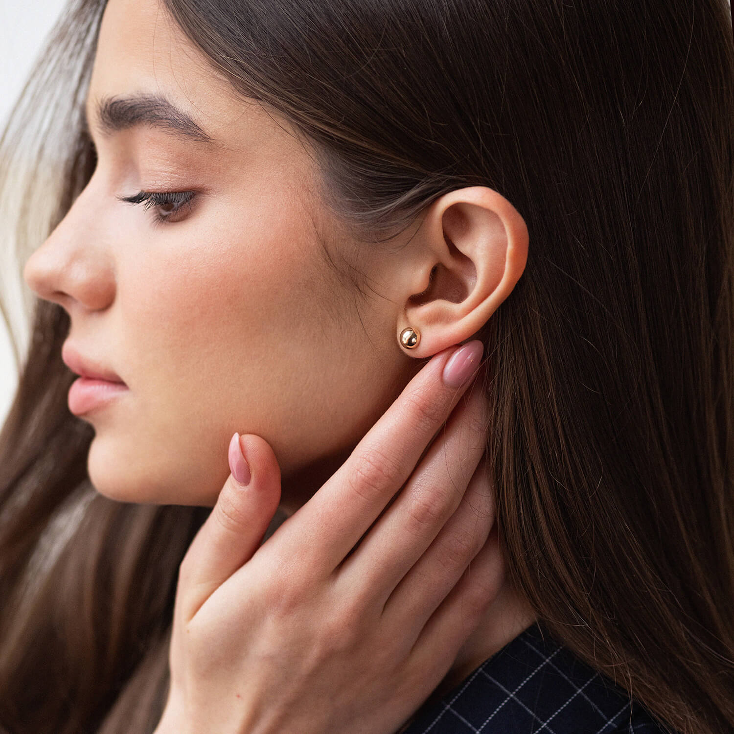 Top view of 14k gold stud earrings with post clasp, solid gold 585 detail-timeless gold studs-classic ball stud earrings