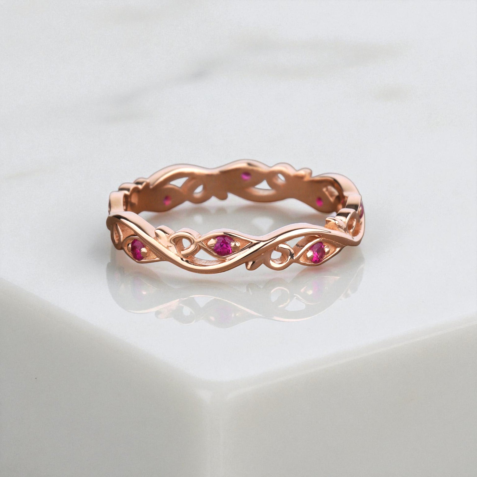 Rose gold ring with embedded gemstones -Floral Ruby Band-Stacking ruby band