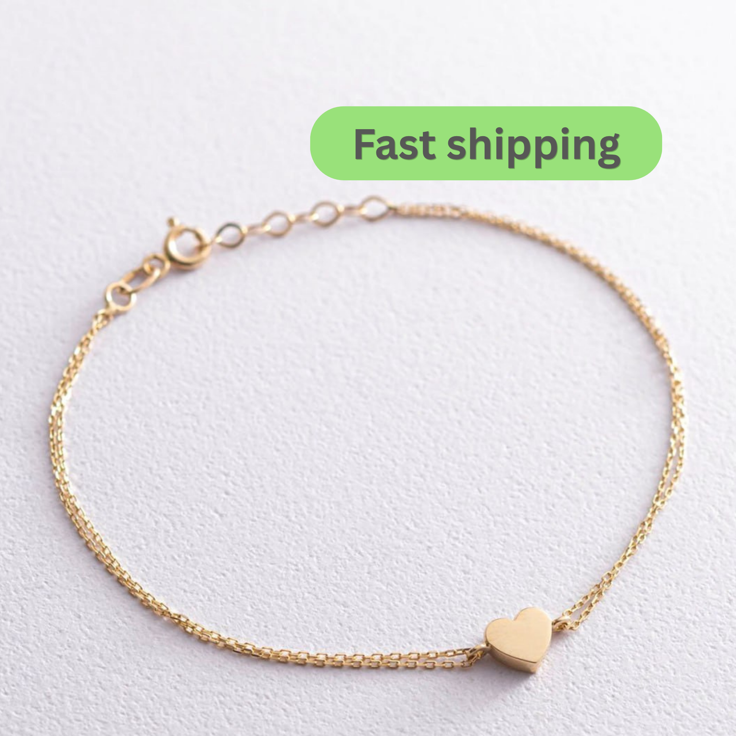 A delicate gold chain bracelet with a small heart-shaped charm-gold heart bracelet-14k gold bracelet-double chain bracelet