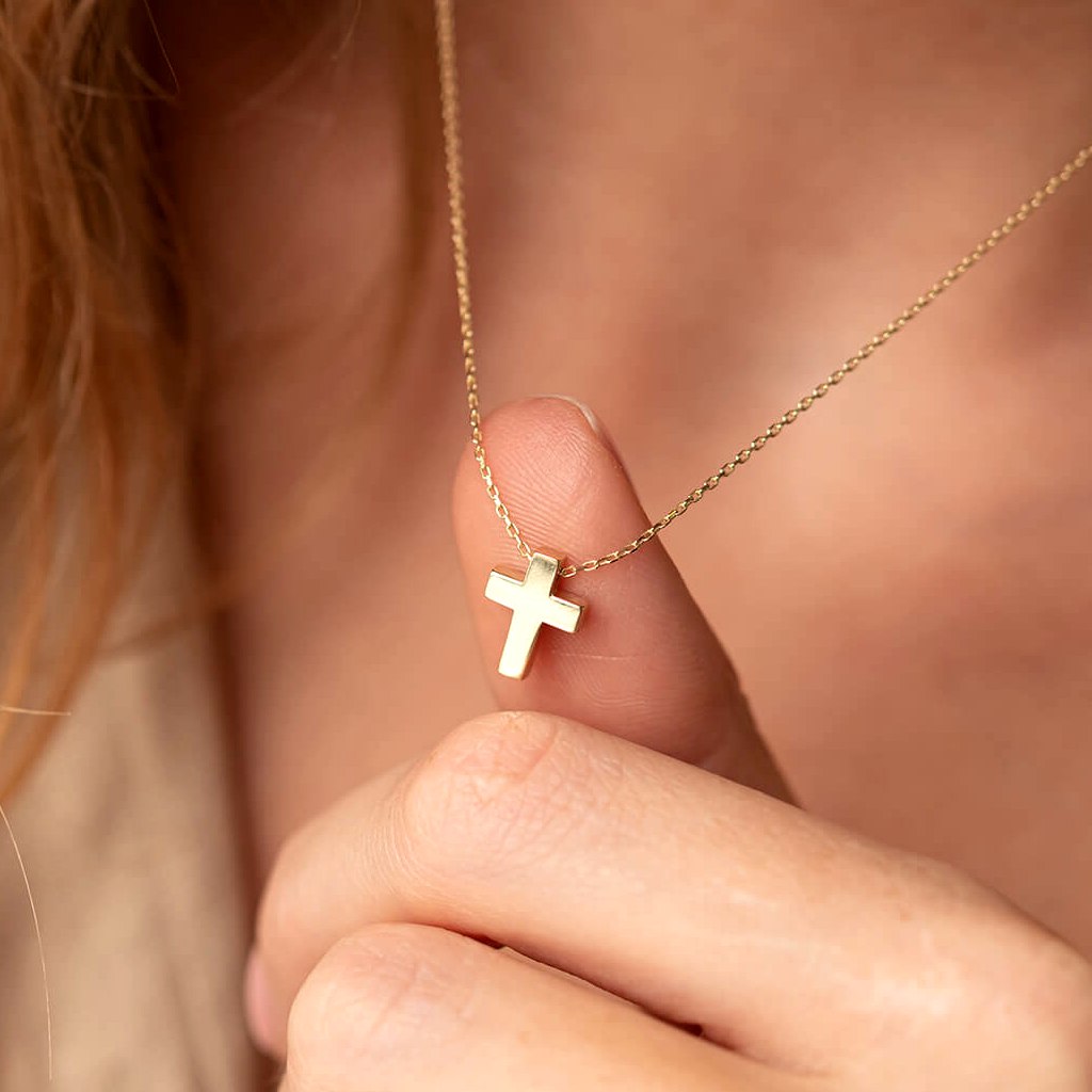 Adjustable gold cross necklace worn elegantly as an everyday or special occasion accessory-delicate gold chain necklace-gold cross necklace