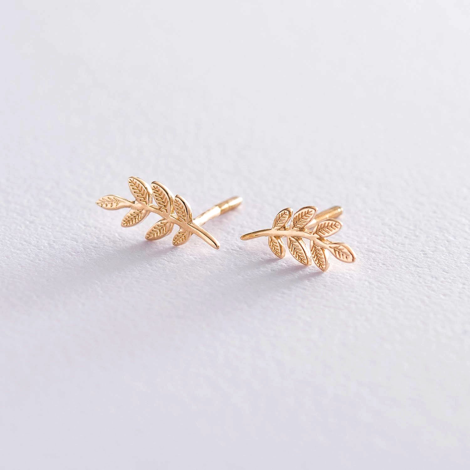 Pair of gold leaf-shaped earrings -Twig Stud Earrings-Simple Everyday Gold Earrings