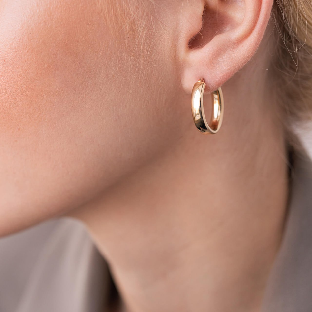 Gold hoop earrings displayed in a decorative gift box with branded logo-dainty gold hoops-gold hoop earrings