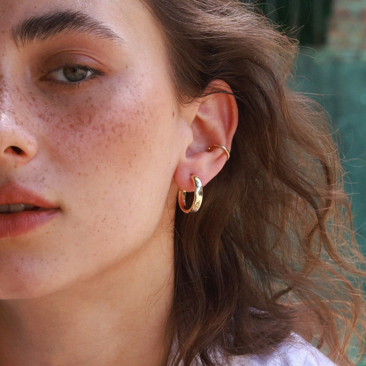Minimalist 14k gold hoops worn as everyday jewelry, elegant and lightweight-everyday gold earrings-gift for her