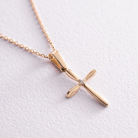 Close-up of polished gold cross pendant, solid 14k gold 585-minimalist cross pendant-solid gold cross jewelry
