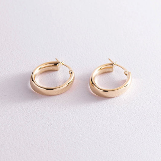 Pair of classic gold circle earrings on a white background, 14k gold 585-classic hoop earrings-timeless earrings