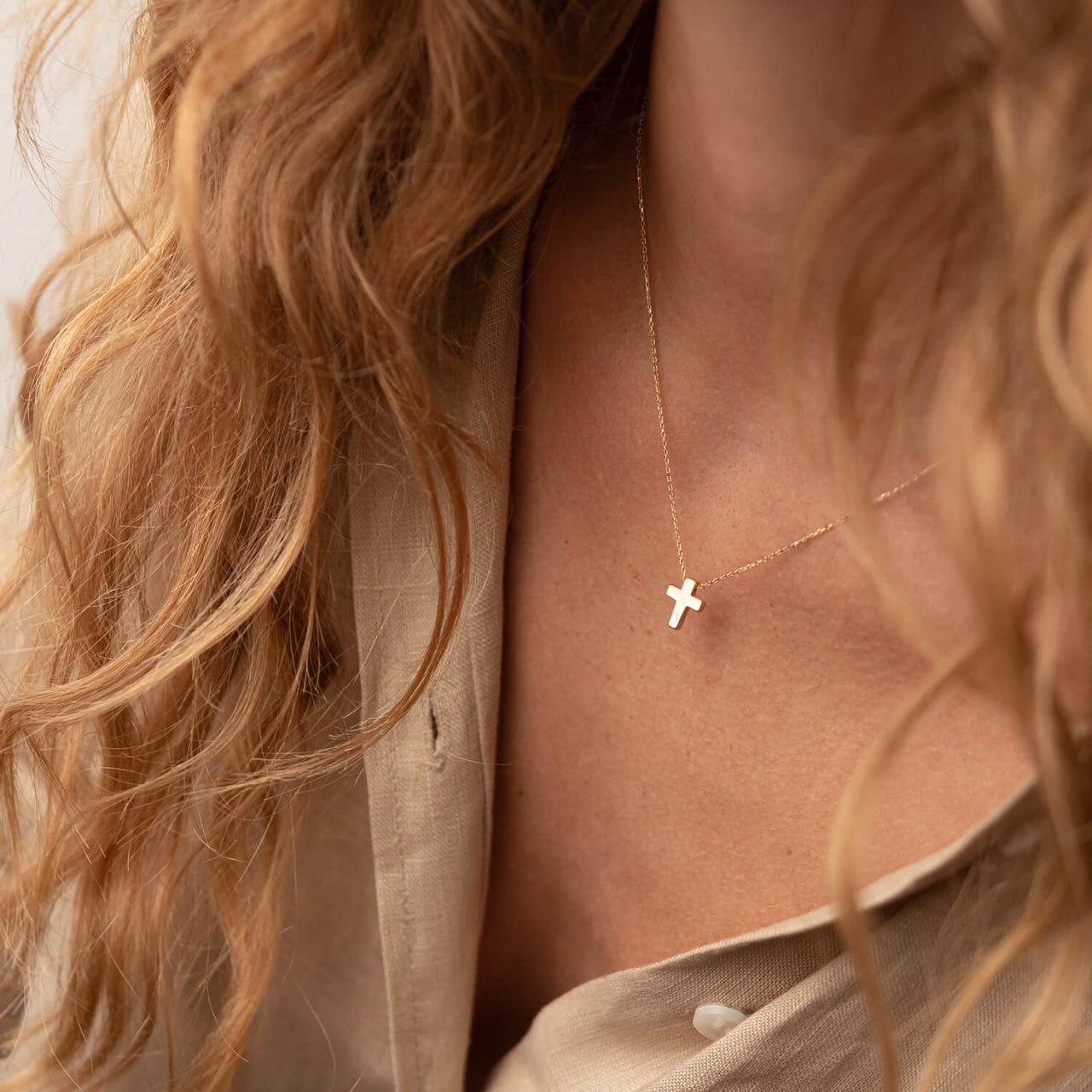 Top view of solid gold cross necklace with spring ring clasp, fine jewelry detail shot-gold cross pendant-minimalist cross necklace