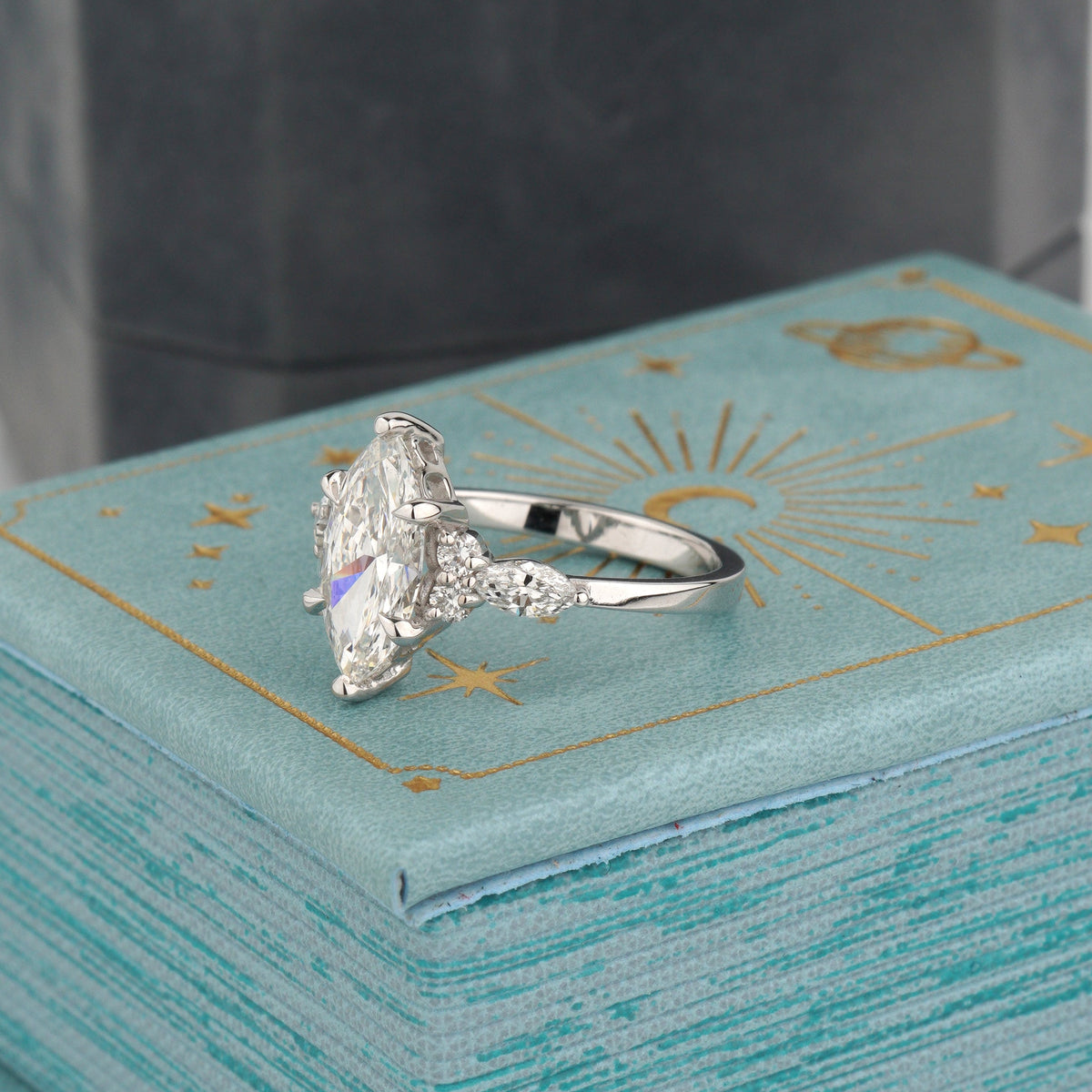 Setting: Art deco-inspired cluster design-solid 14k white gold, this ring is a striking blend of vintage romance and modern edge
