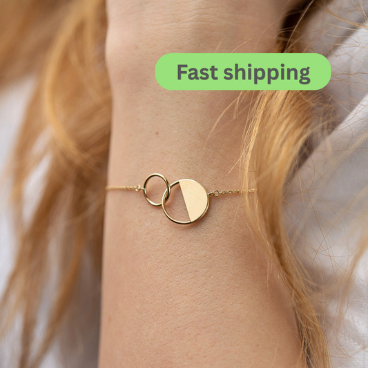 Gold bracelet with interlocking circles on a wrist-Dainty gold bracelet-Delicate bracelet