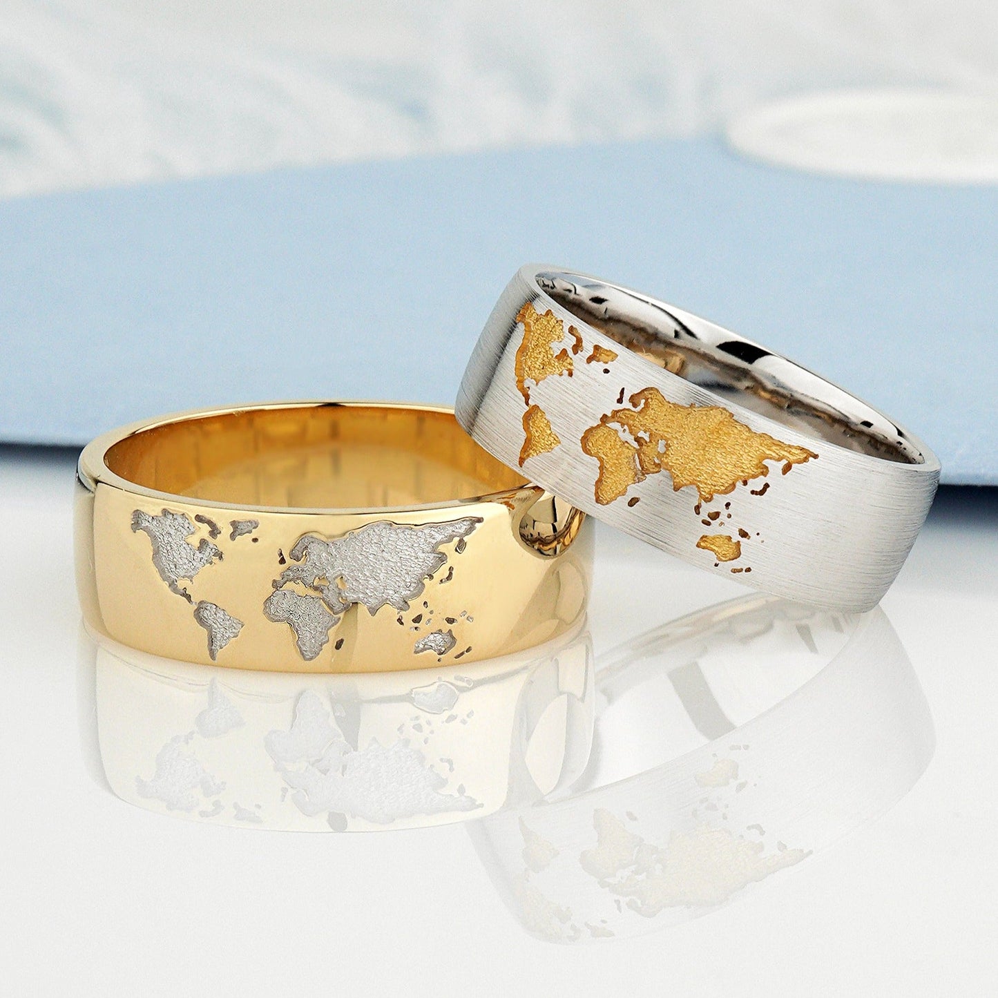 Gold wedding rings set with world map - escorialjewelry