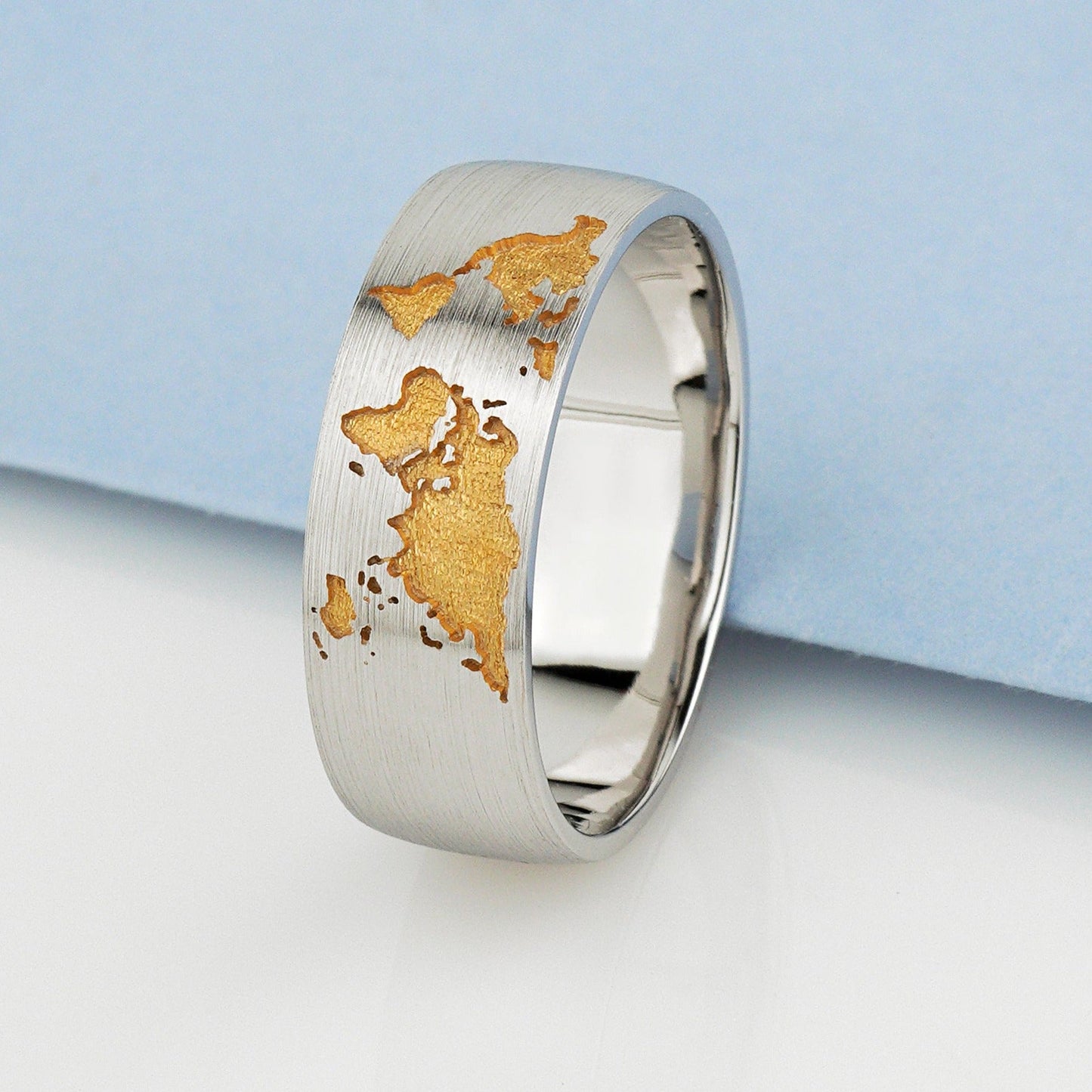 Gold wedding rings set with world map - escorialjewelry