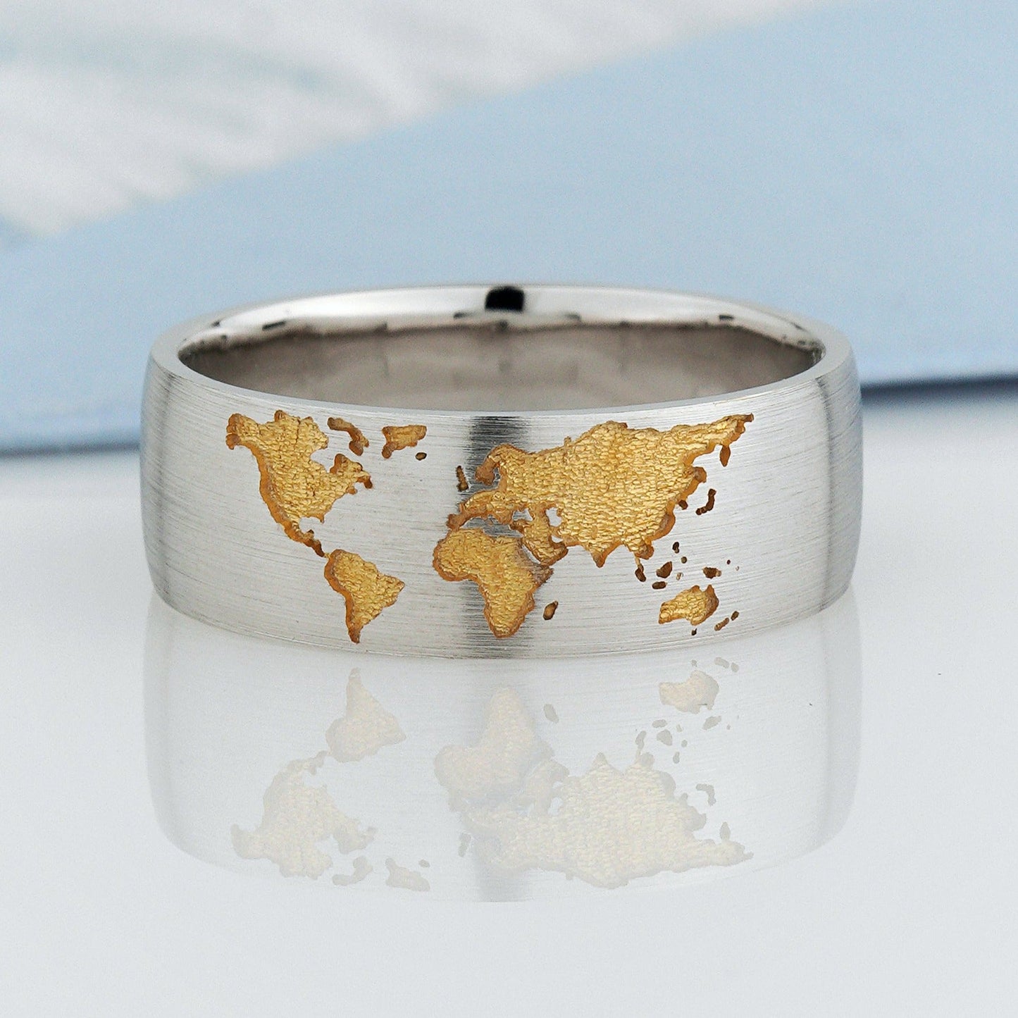 Gold wedding rings set with world map - escorialjewelry