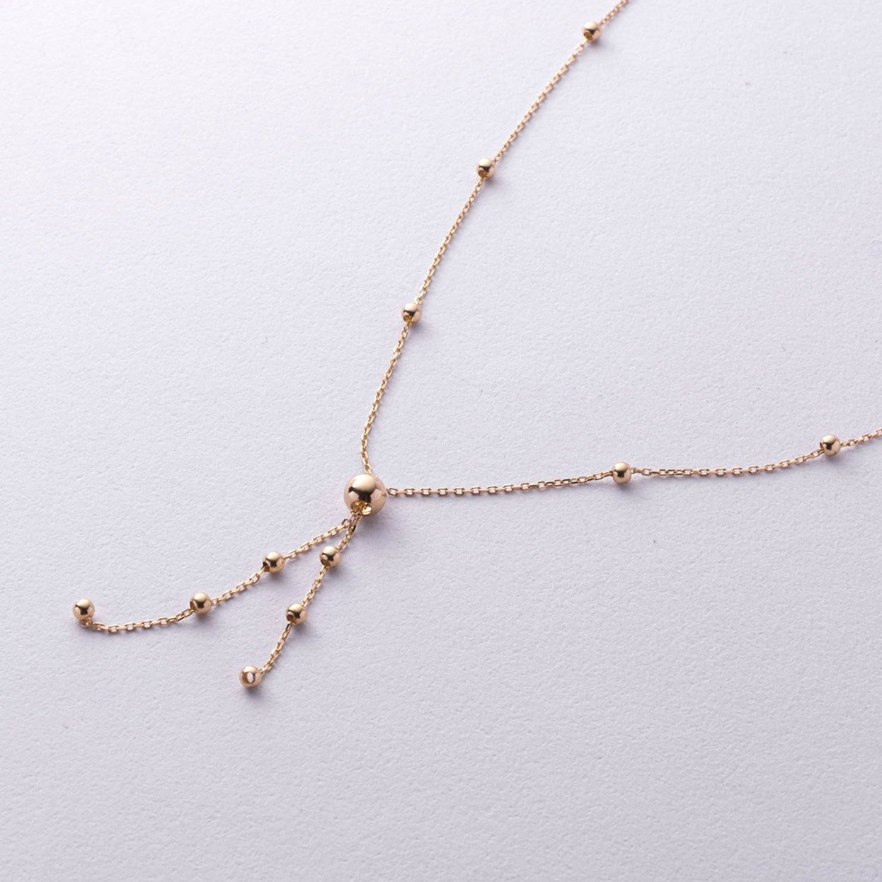 A delicate rose gold Y-shaped necklace with small bead accents -Delicate Gold Necklace-Solid Gold Beaded Necklace