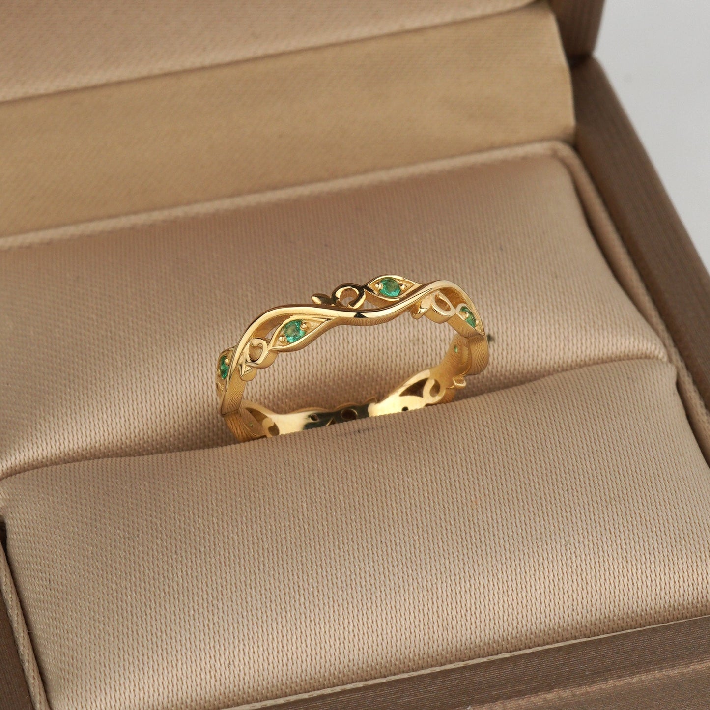 gold floral ring emeralds