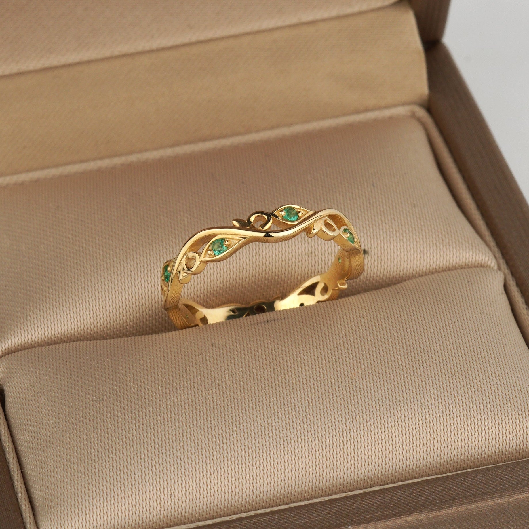 gold floral ring emeralds