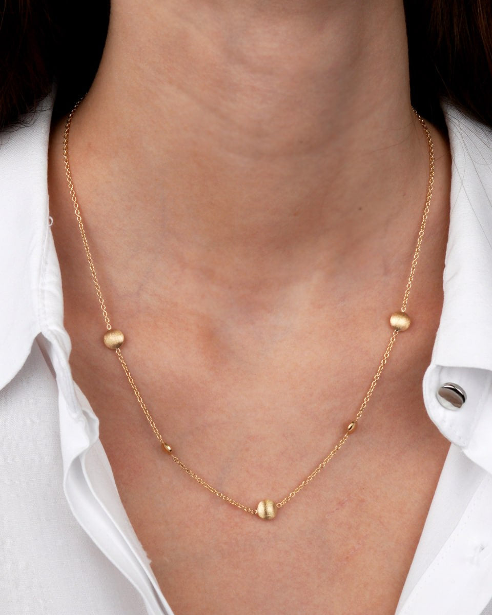 
Metal: 14k Yellow Gold (585)
Style: Circle bead station chain
Length: 42 cm + 3 cm adjustable
Weight: 3.5–3.6 g
Clasp: Spring ring-Gold Beaded Chain Necklace