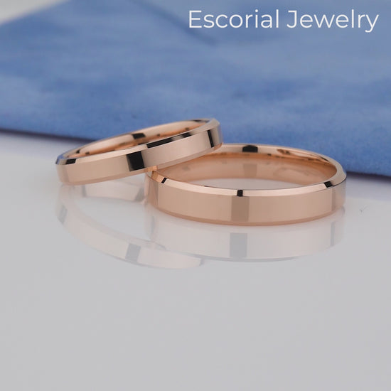 Matching gold rings- clean lines and modern minimalism- stacked with an engagement ring