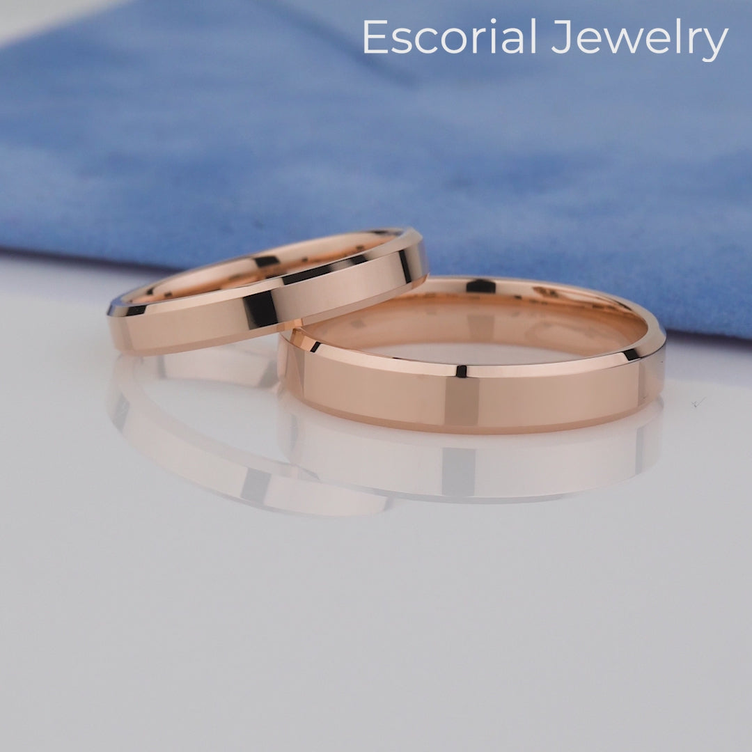 Matching gold rings- clean lines and modern minimalism- stacked with an engagement ring