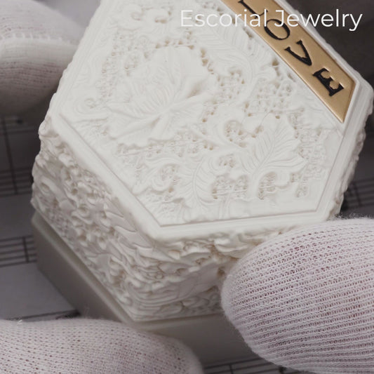 oval diamond engagement ring-total diamond weight: 0.66 ct-ring wrapped in a soft halo of pavé diamonds