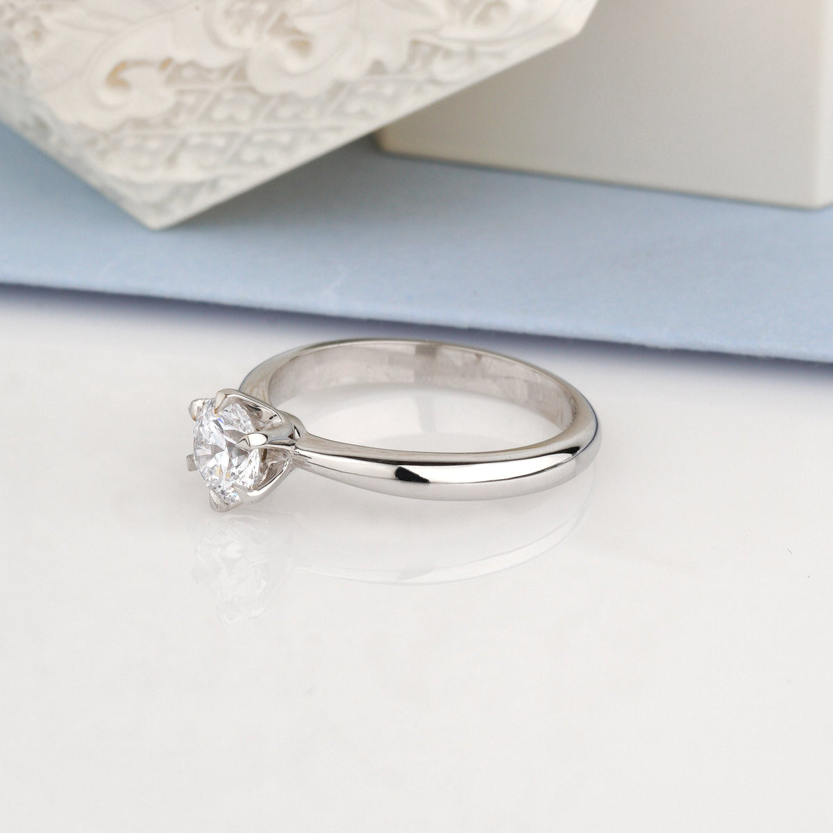 A white solitaire engagement ring with a round clear gemstone-lab diamond ring-white gold engagement ring-solitaire engagement ring-igi diamond engagement ring 