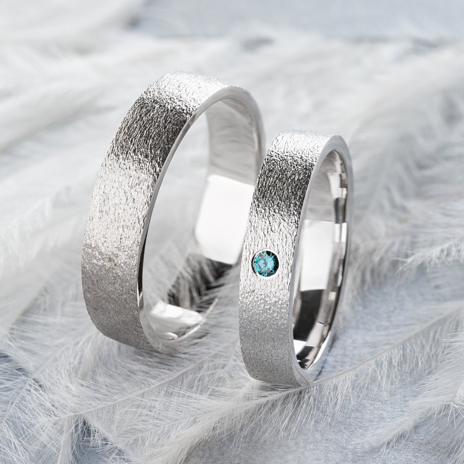 textured-wedding-bands-with-blue-diamond