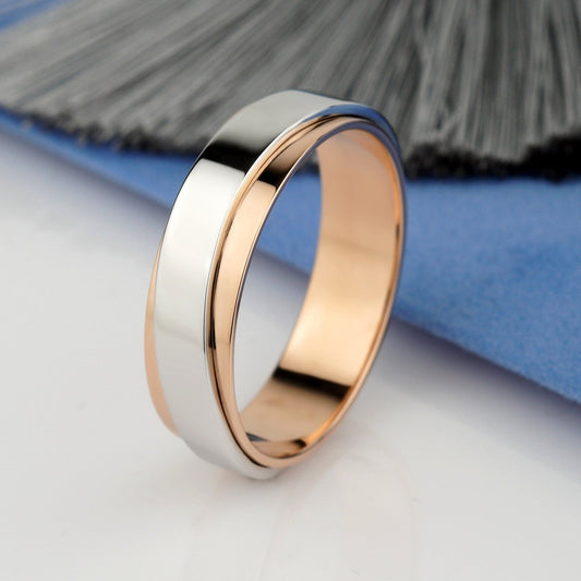 A two-tone metal band ring with a polished silver outer band and a rose gold inner band-unique wedding band-wedding band for him gold