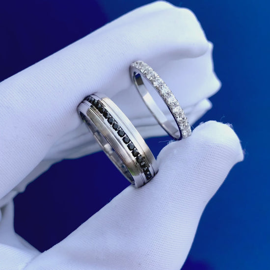His and hers wedding bands with black and white diamonds. Gold wedding rings set. Diamonds wedding bands. White gold wedding rings with diamonds.
