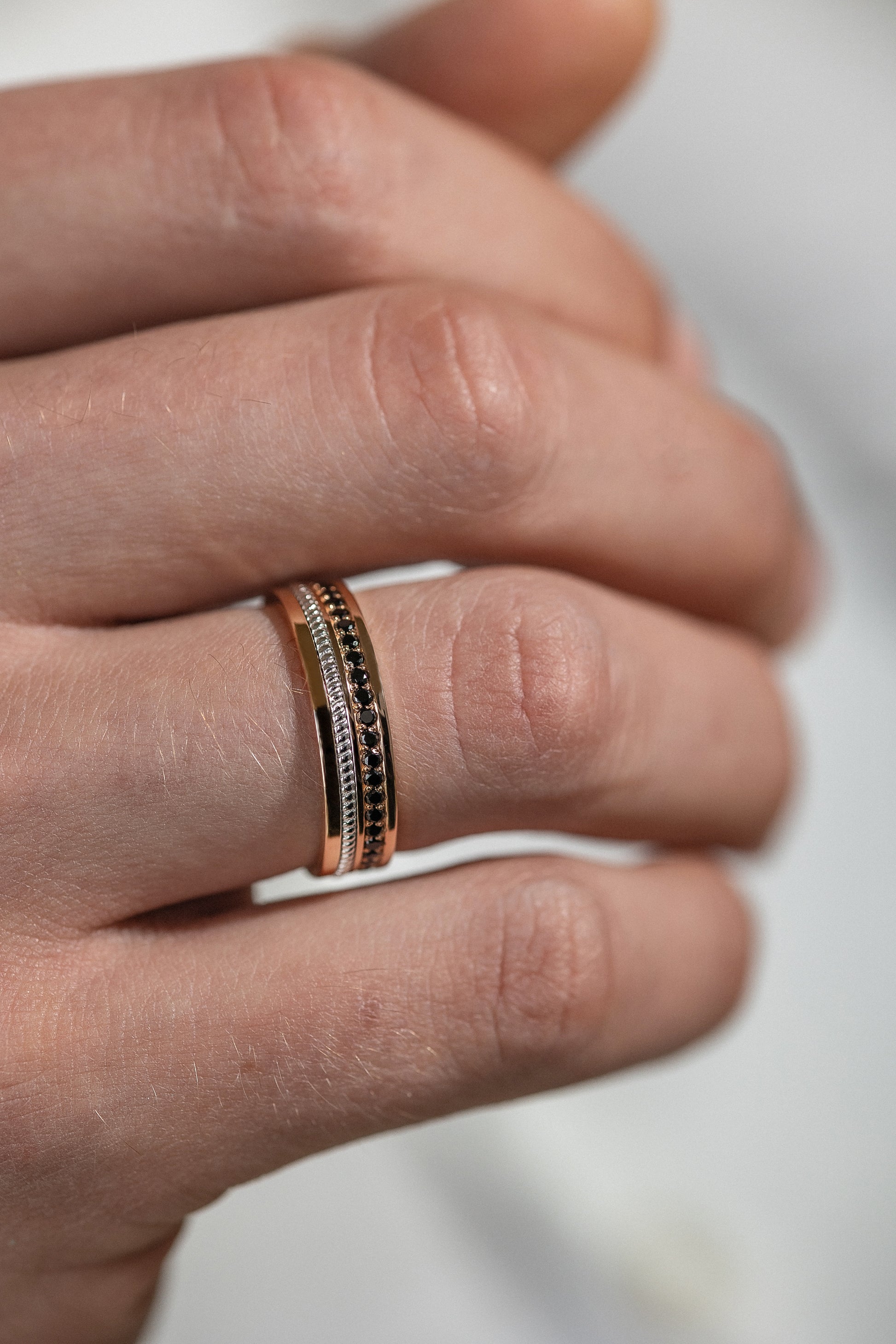 Two-tone men's wedding ring with black stones. Wedding band for men. Unique men's ring. Black diamonds band. Ring for him. Men's gold band. Gold wedding ring with black diamonds. Black stones ring.