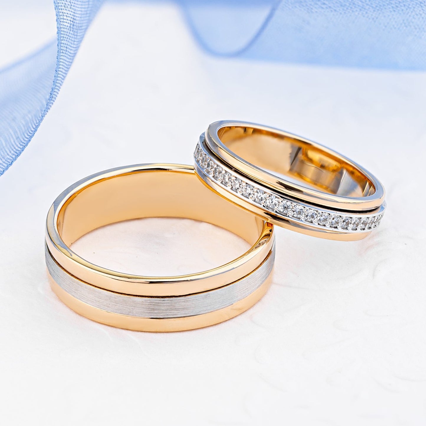 Couple rings made of 14k gold. Matching wedding bands. His and hers wedding rings set. Two tonw wedding bands. Gold wedding rings set